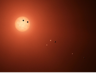 This illustration shows the seven TRAPPIST-1 planets as they might look as viewed from Earth using a fictional, incredibly powerful telescope. Photo courtesy of NASA/JPL-Caltech