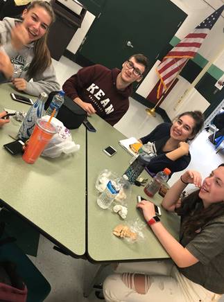 The interviewed seniors in the cafeteria. Photo by Shreyal Sharma