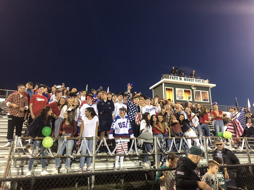 Kinnelon student section dresses with a USA theme for the Kinnelon vs Wallkill Valley matchup. Picture credit: KHS athletics Twitter.