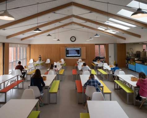 Students eat lunch at a safe distance to avoid the potential transmission of COVID-19.