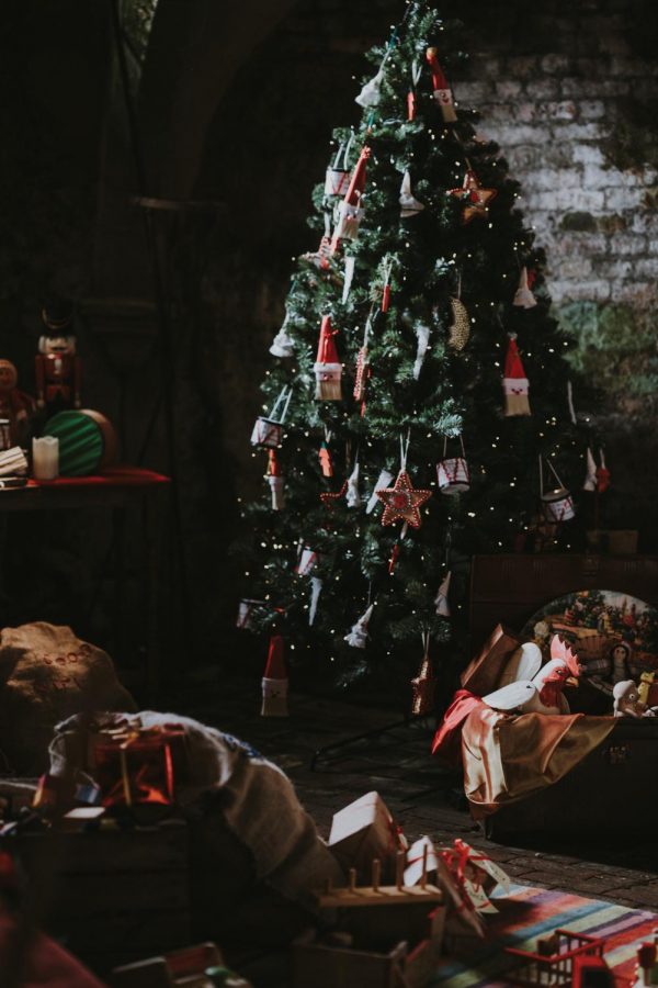 Decorating trees with ornaments and gift-giving are common Christmas traditions.