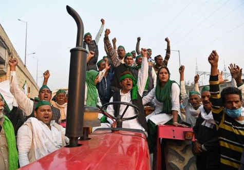 Photo courtesy of tasnimnews.com. Indian Farmers and their families come together to protest against Indian Primeminister Modi’s latest agriculture law’s adding restrictions on farmers.
