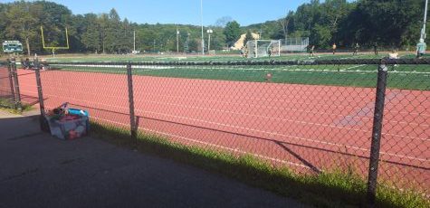 Kinnelon High School track and race course with the soccer team in the background.