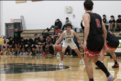 Guard Nick Canariato dribbles around a Boonton defender with just minutes left in the game.