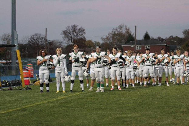 The+Kinnelon+High+School+football+team+salutes+the+flag+during+the+national+anthem%2C+as+they+play+in+the+Semifinal+round+of+the+Group+1+North+NJSIAA+tournament.%0A