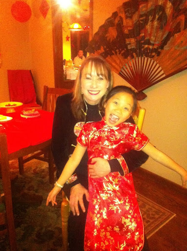 My mom and I at one of our Chinese New Year parties. Photo from Farren Bowers