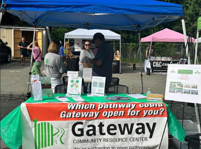 Gateway community booth showcases its resources.