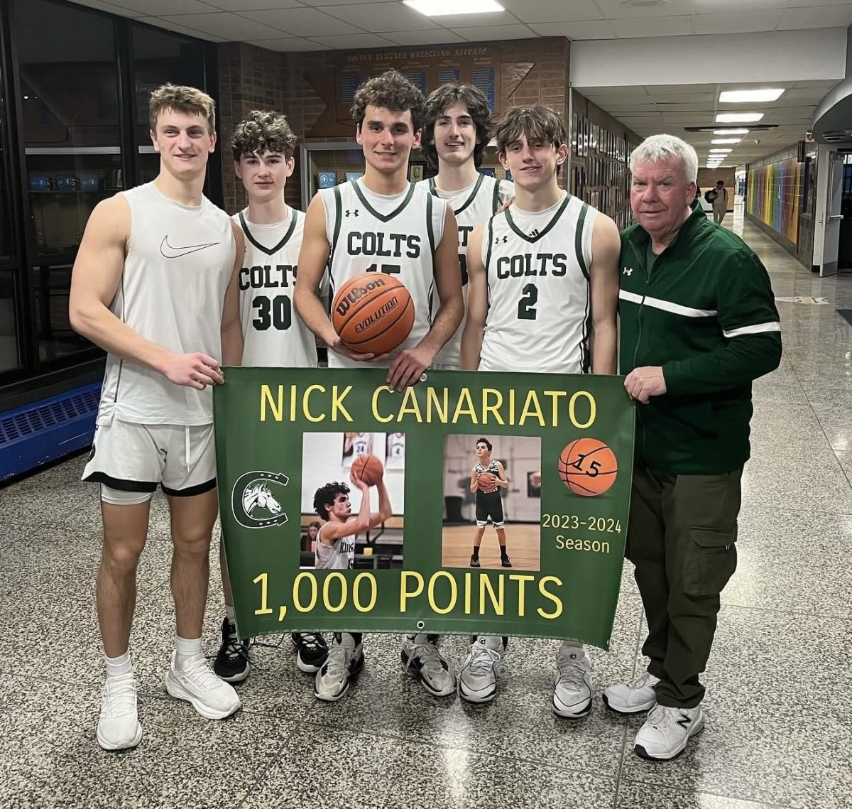 Ryan Geng, Zach Grande, Nick Canariato, Jace Marone, Dylan Charles, and Coach Dave Kessinger after Canariatos 1000th point game