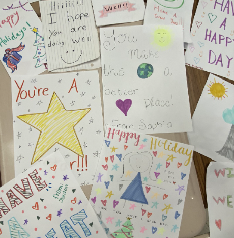Examples of the handmade cards designed by NEHS students to be sent out with the delivered meals.