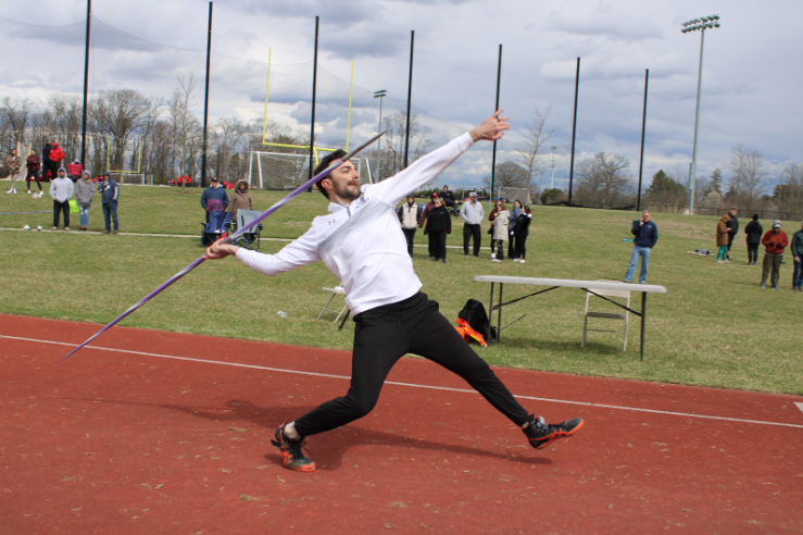 Gebhardt demonstrating the skill of throwing a javelin