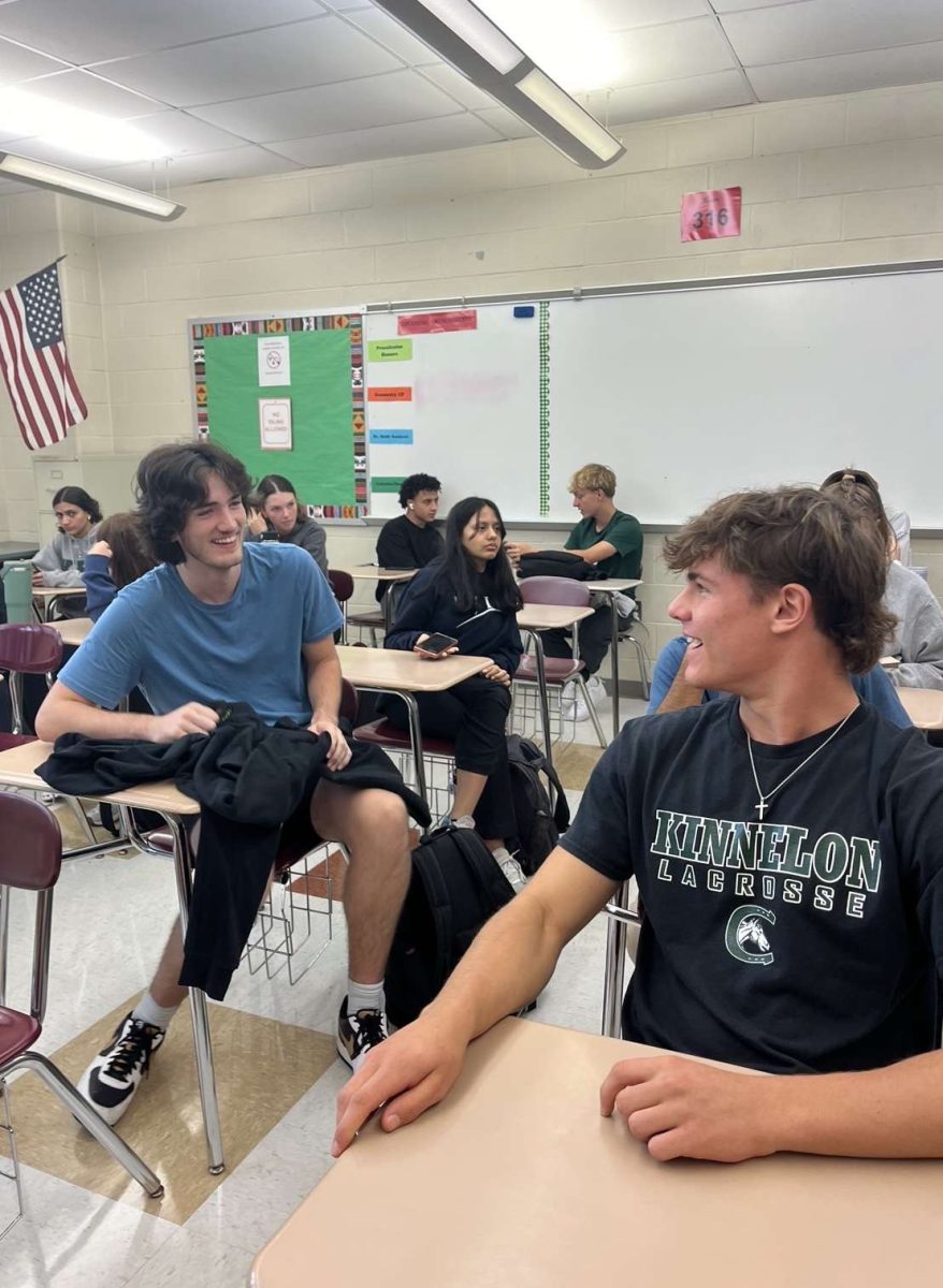 Jonny Papendick talking with a friend in math class.