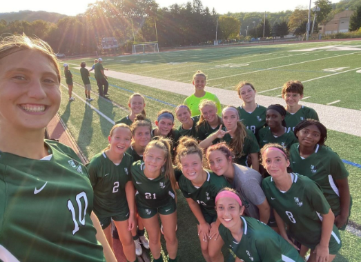 Senior captain Alessia Cerulo takes a selfie of the team after a big KGS win against Morris Catholic.