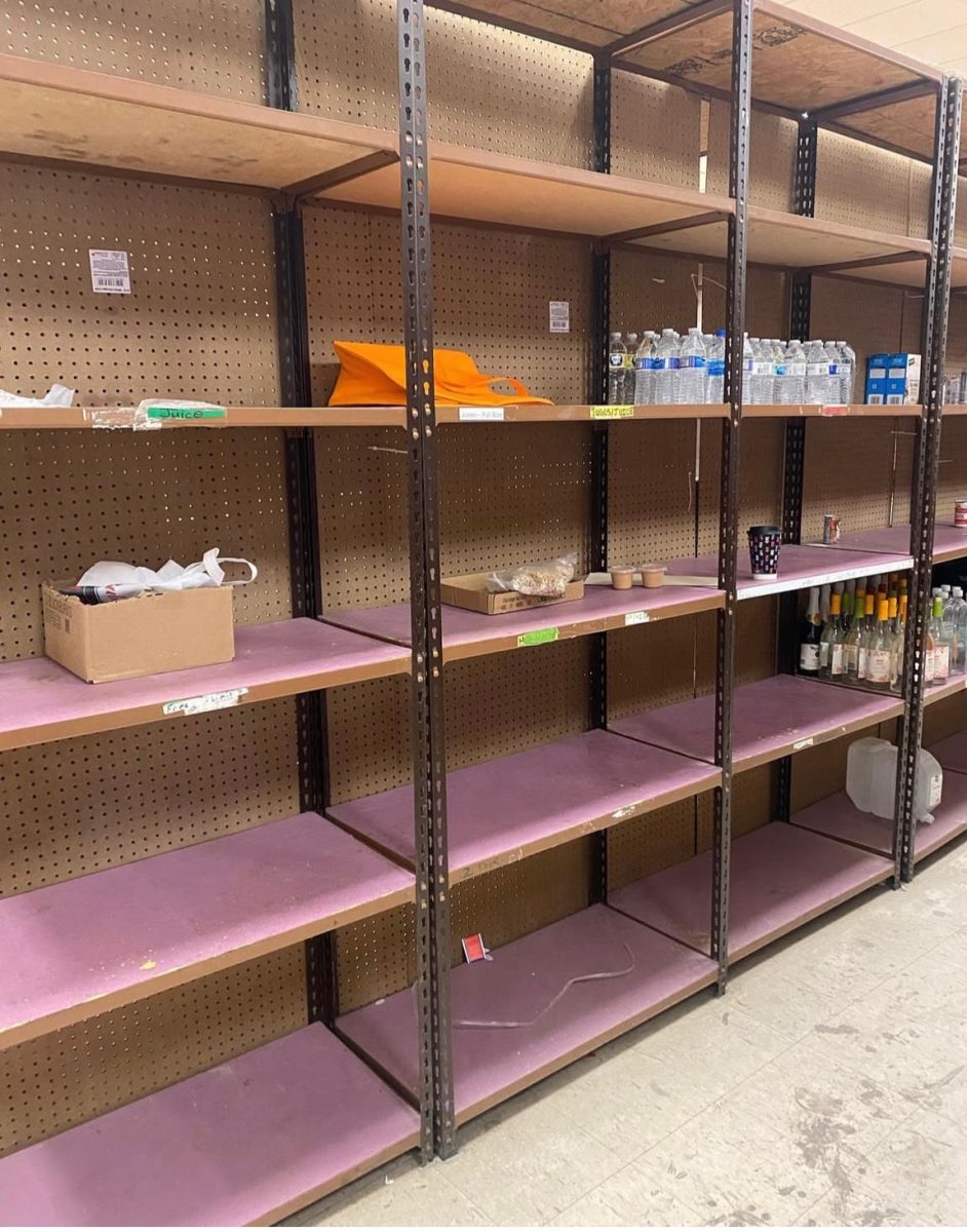 Father English Food Pantry shelves in February 2025, once holiday donations were depleted. 