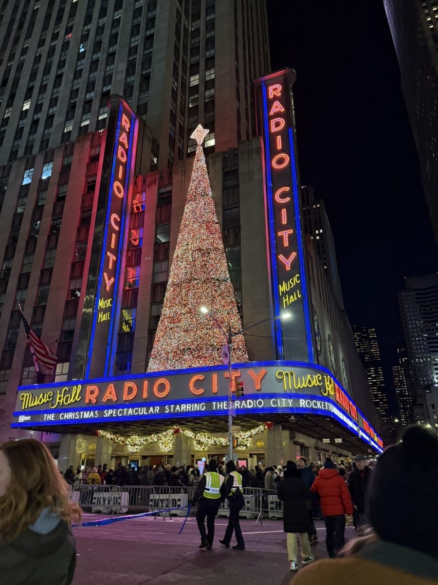 Radio City decorated with a tree and garland for the holiday season. 