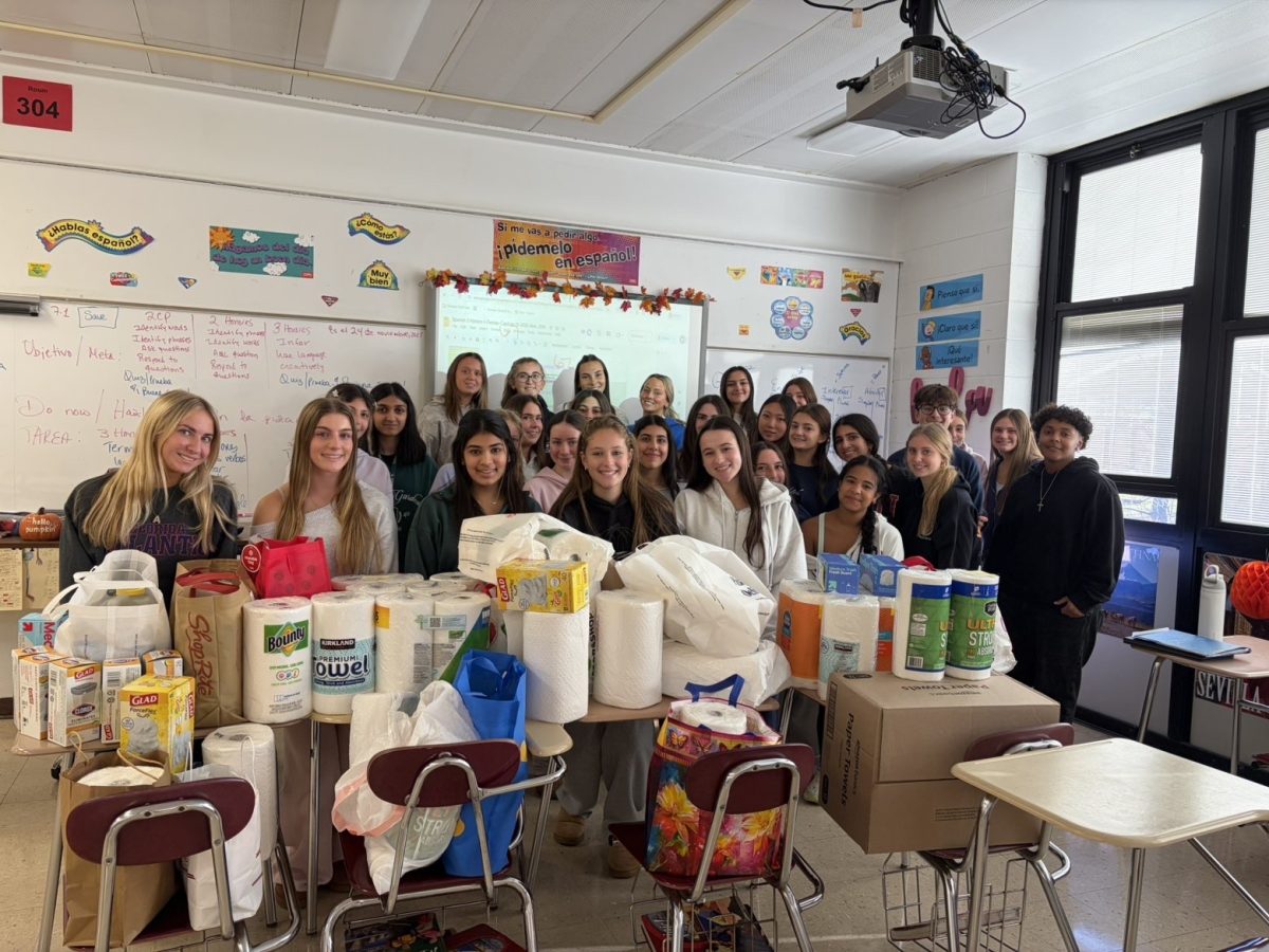 Animal Activist Club members with donations received for one of their fundraisers. 
