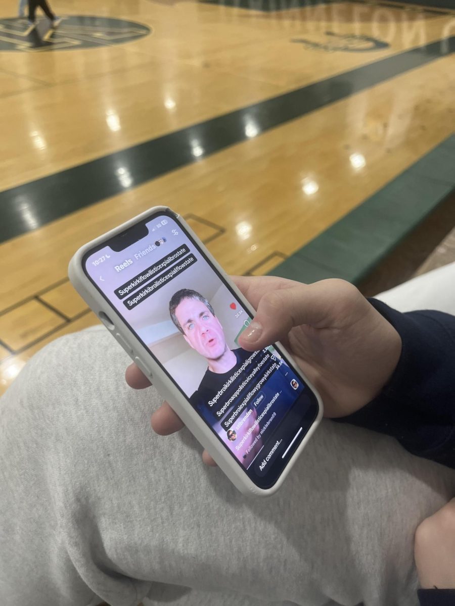 A student scrolling on Instagram reels