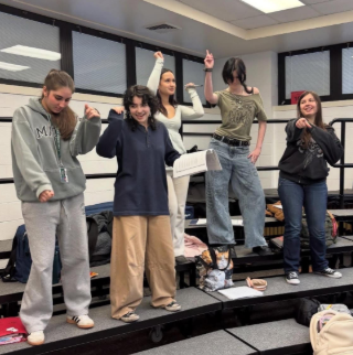The cast of Mamma Mia! during rehearsals.