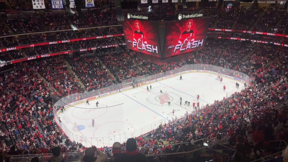 Devils fans celebrate Jack Hughes' hat trick by throwing hats onto the ice, Mar 7th, 2026.