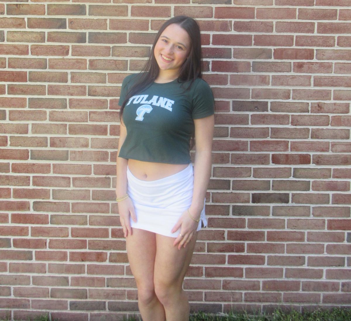 Senior Kaitlyn Kispert poses, celebrating her college commitment. 