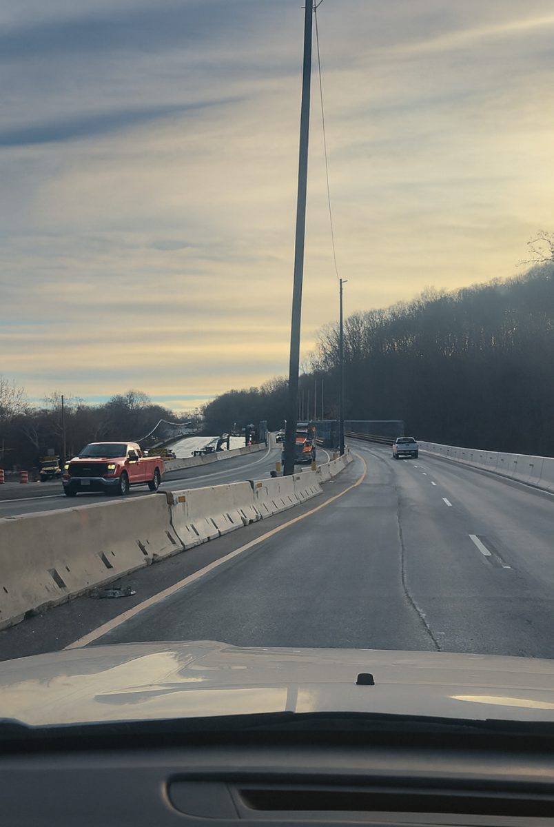Cars travel across the temporary Route 23 bridge as construction continues.