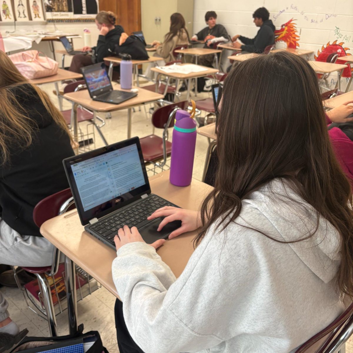 KHS student athlete utilizing time to complete work in school.