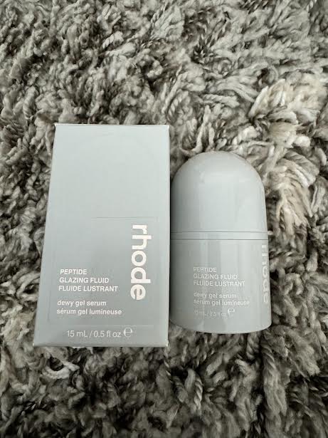 Travel-size Rhode Peptide Glazing Fluid with original box.